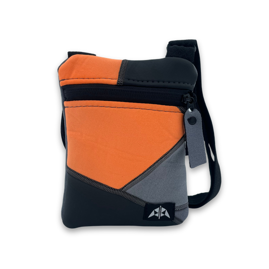 Recycled Crossbody Bag with zipped opening and adjustable strap in orange and grey.