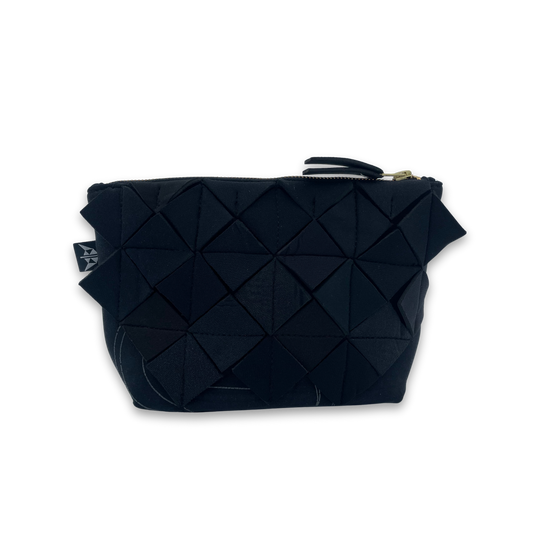 Recycled washbag with textured geometric pattern in black. Made from recycled wetsuits.