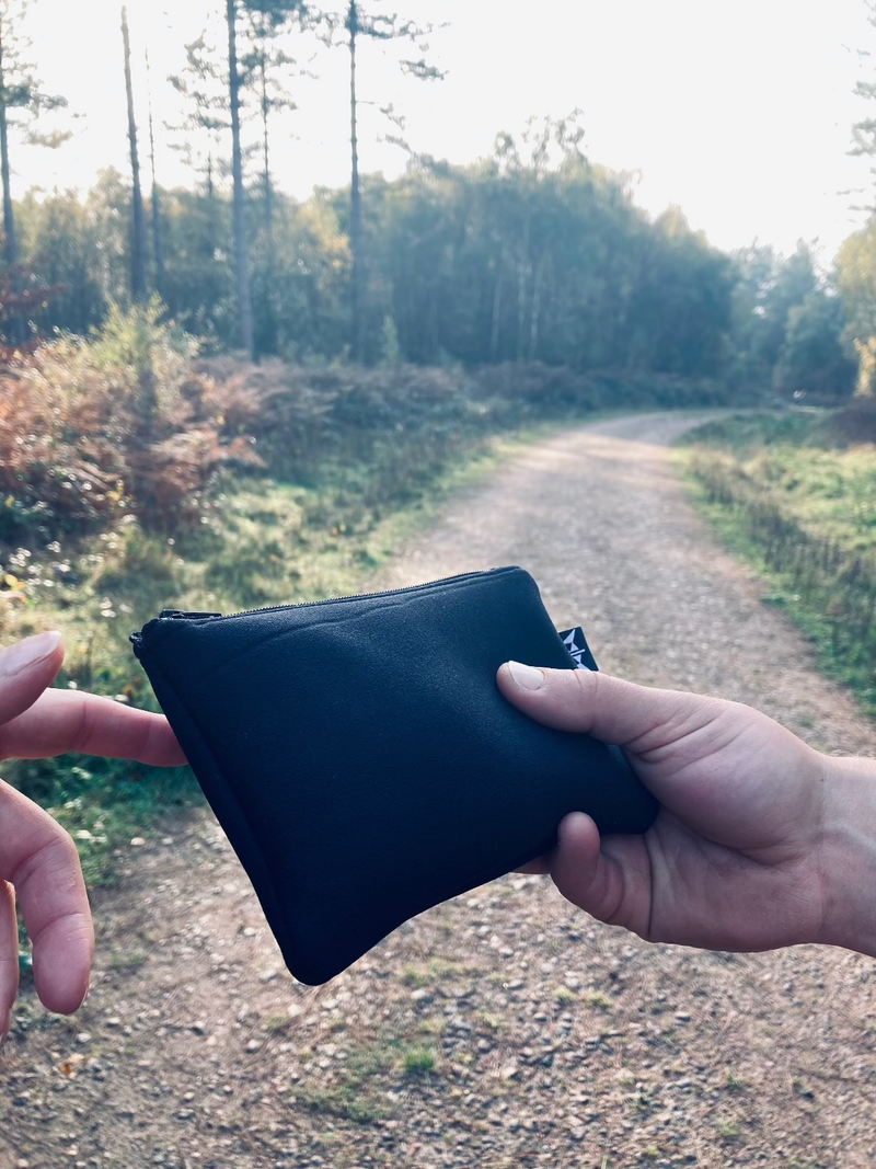 Rectangle pouch in black made from upcycled wetsuits.