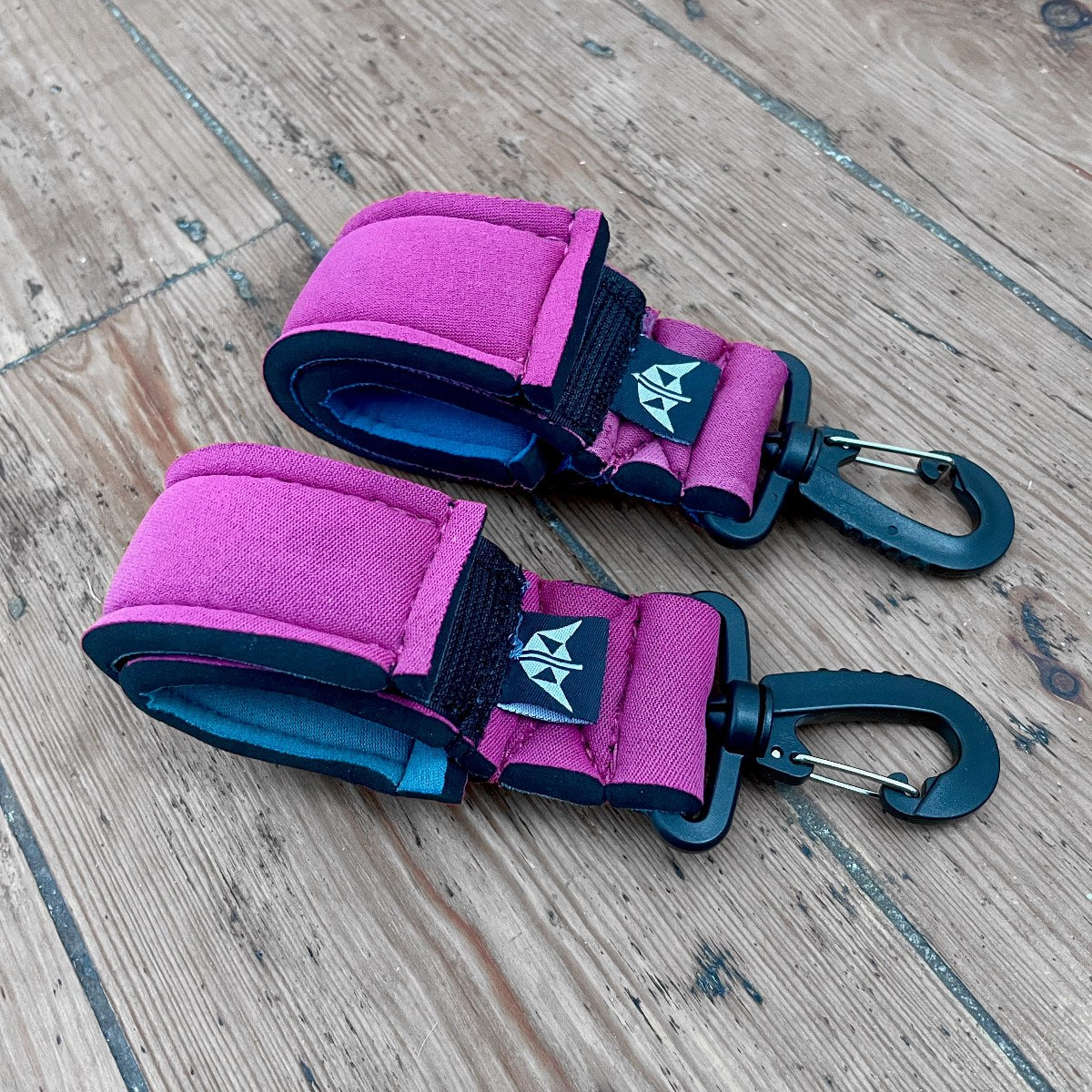 SUP Paddle Keepers in Pink. Made from recycled wetsuits.