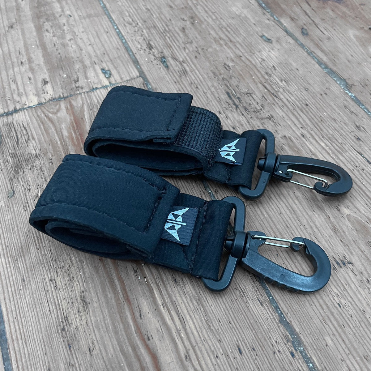 SUP Paddle Clips made from recycled wetsuits.