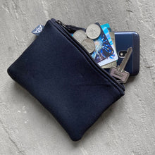 Load image into Gallery viewer, Earthbound Rectangle Neoprene Pouch in Black with personal belongings
